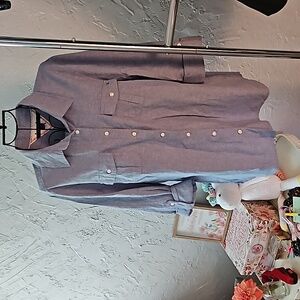 Tommy Hilfiger long sleeve roll tab blue button-down shirt.  Size L.